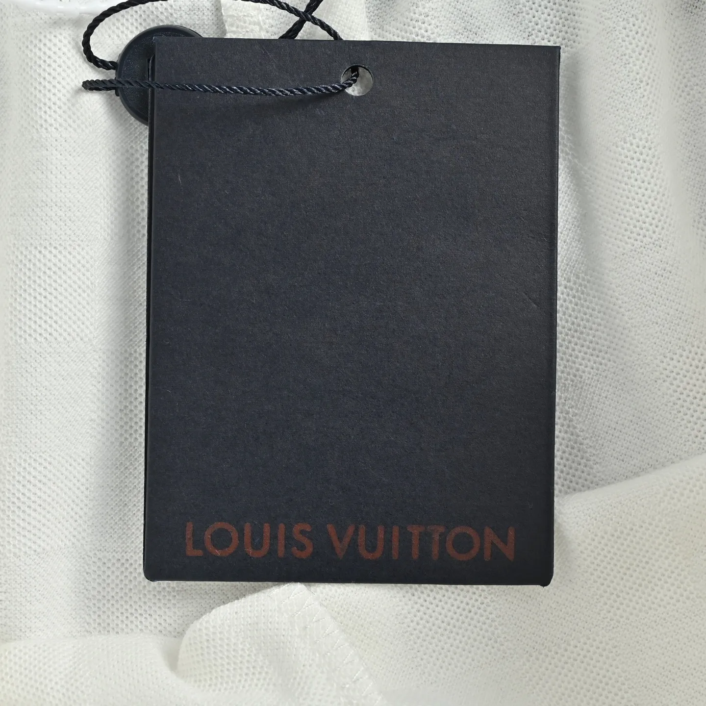 Louis Vuitton/Louis Vuitton embroidered badge checkerboard shorts
